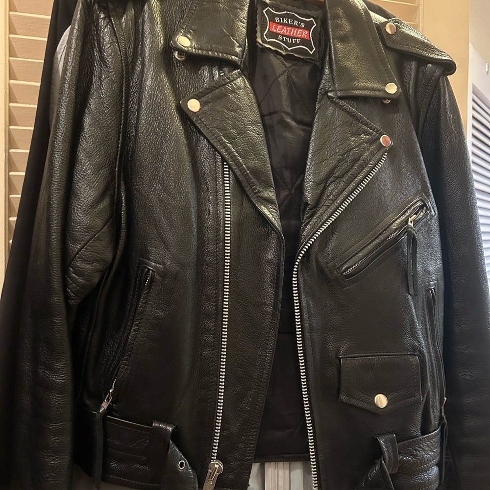 Black,  genuine leather motorcycle jacket. Excellent condition.